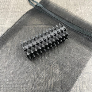 Een shibari rope spike in de kleur zwart