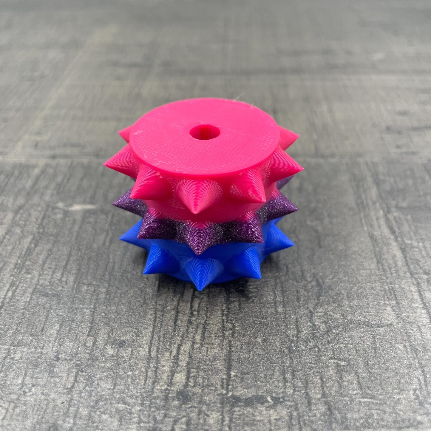 Een los rollertje voor een BDSM pinwheel in de kleuren van de bi-seksuele vlag