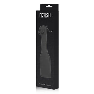 A vegan leather paddle for BDSM in black, with box