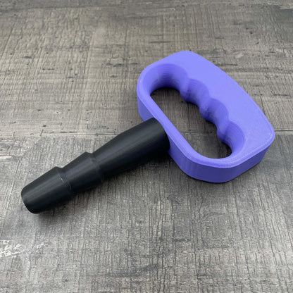 Een adapter voor vac-u-lock seks toys met een paarse handgreep.