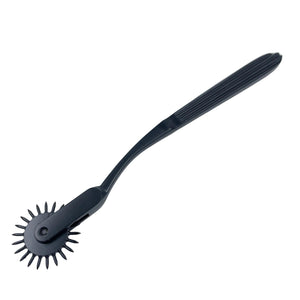 A wartenberg pinwheel for BDSM in black