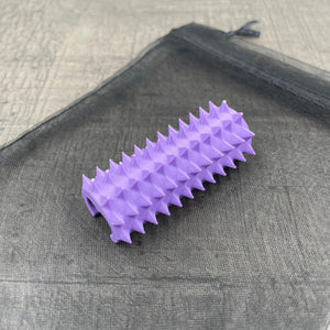 Een shibari rope spike in de kleur lila