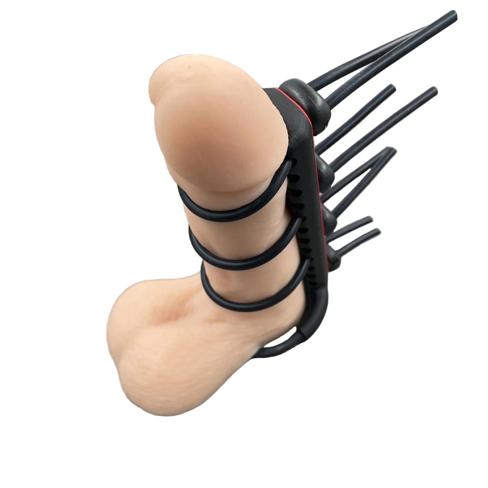 Een e-stim BDSM toy voor de penis met straps - met dildo als voorbeeld