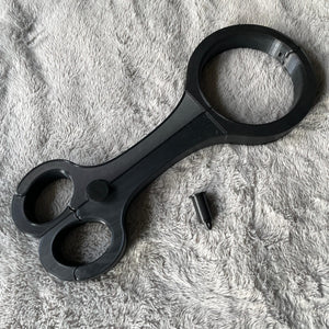 Een BDSM rigid fiddle in het zwart